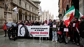 People gather to raise awareness of the case of the Italian antifascist activist Ilaria Salis detained in Hungary, in Milan, Italy, Saturday, Feb. 10, 2024