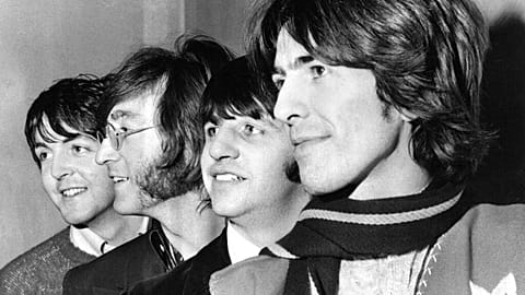 The Beatles in 1968, with George Harrison on the right.