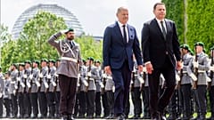 German Chancellor Olaf Scholz, centre, and Portugal's Prime Minister Luis Montenegro walk during their meeting at the Federal Chancellery in Berlin, Friday, May 24, 2024.