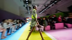 A model wears a creation as part of the Benetton women's Spring Summer 2024 collection presented in Milan, Italy, Thursday, Sept. 21, 2023. (AP Photo/Luca Bruno)