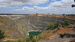 The open pit of the Greenbushes mine, Western Australia, seen from the public mine lookout.