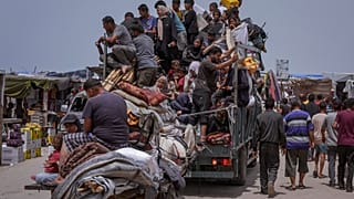 Palestinians fleeing from the southern Gaza city of Rafah during an Israeli ground and air offensive in the city on Tuesday, May 28, 2024.
