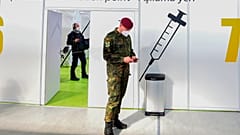 A soldier of the German Armed Forces Bundeswehr stands inside a new vaccination centre at the former Tempelhof airport in Berlin, Germany.