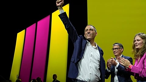 Raphael Glucksmann lead candidate of the French Socialist Party for the upcoming European election, arrives onstage during a meeting in Paris, Thursday, May 30, 2024. 