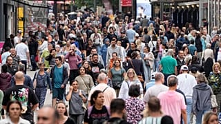 People walking the main shopping street in Dortmund, Germany.