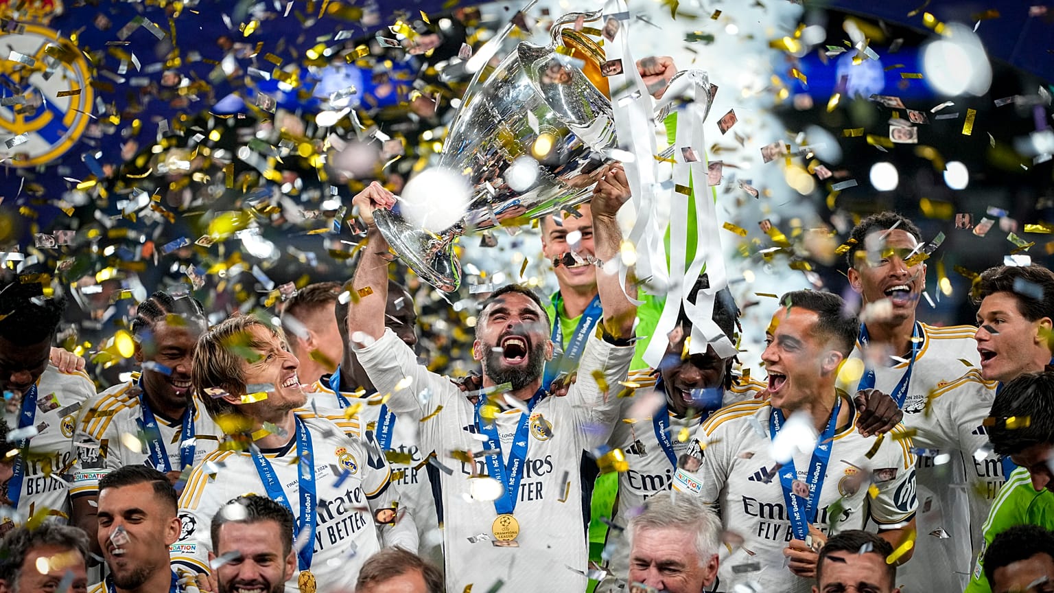 Real Madrid's players celebrate with the trophy after winning the Champions League final at Wembley, June 1, 2024