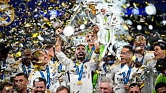Real Madrid's players celebrate with the trophy after winning the Champions League final at Wembley, June 1, 2024