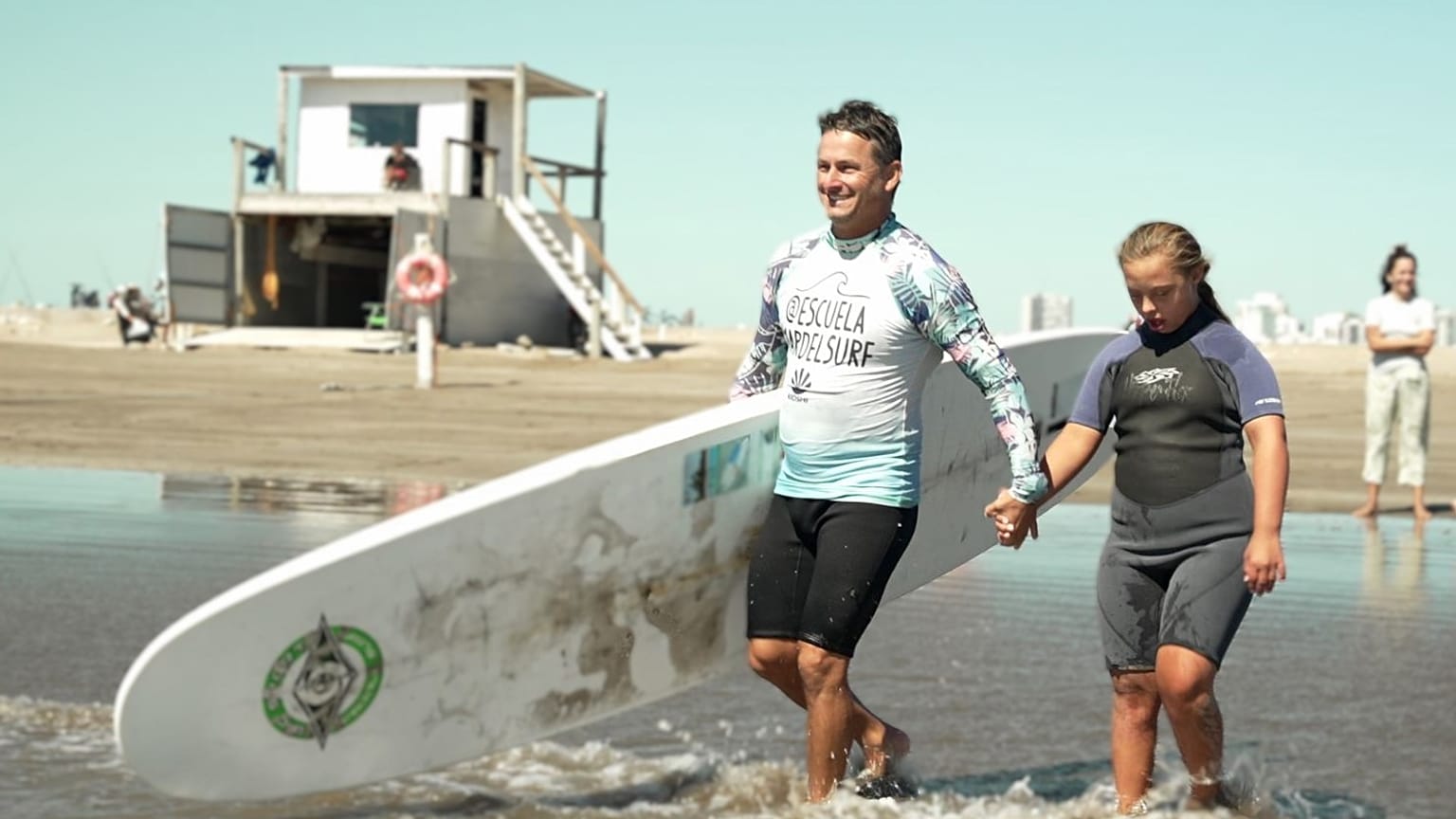 Watch: Pro-surfer paves the way for disabled students to catch waves in Argentina