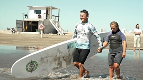 Watch: Pro-surfer paves the way for disabled students to catch waves in Argentina