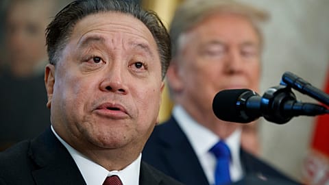 Broadcom CEO Hock Tan speaks as President Donald Trump listens during an event on Nov. 2, 2017 in Washington. 