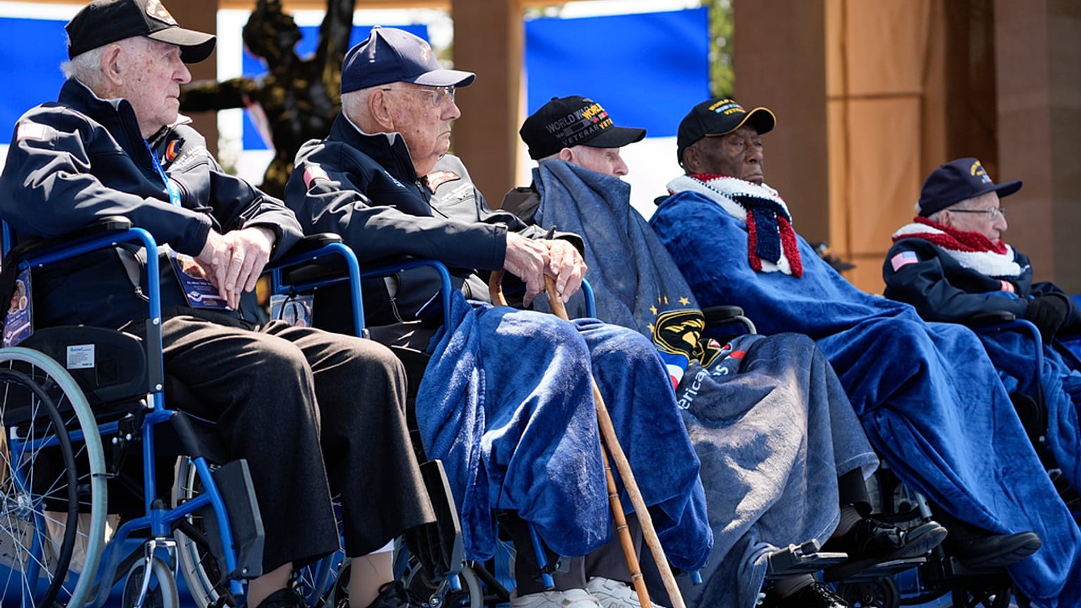 World War II veterans listen during a ceremony to mark the 80th anniversary of D-Day, Thursday, June 6, 2024, in Normandy. 