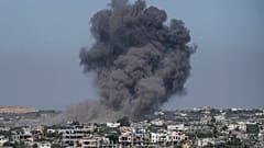 FILE - Smoke rises following an Israeli airstrike in Rafah, Gaza Strip