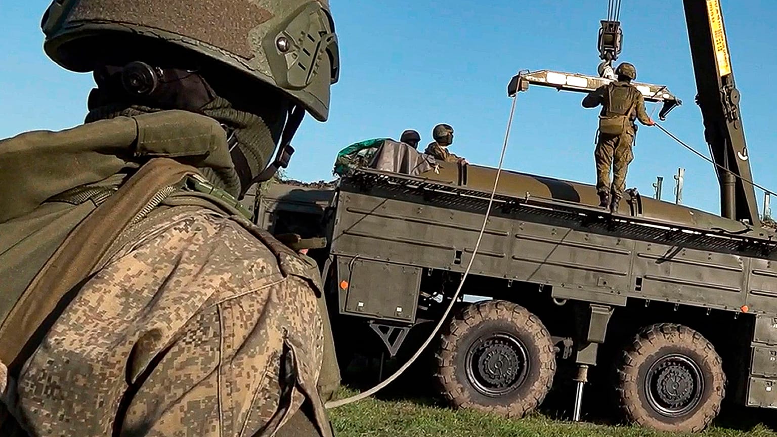 Russian troops prepare a missile launcher for joint Russian-Belarusian drills intended to train the military to use tactical nuclear weapons, 10 June 2024