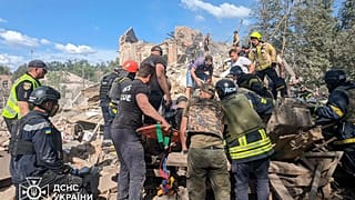 Emergency workers clear the rubble as they search for victims after a Russian missile hit the area, in Kryvyi Rih, Ukraine, Wednesday, June 12, 2024.