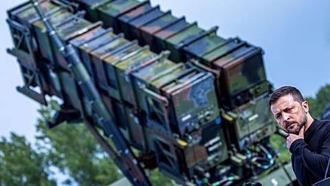 Ukraine's President Volodymyr Zelenskyy stands in front of a Patriot air defense missile system in the German state of Western Pomerania, Tuesday, June 11, 2024.