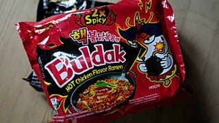 In this photo illustration two packets of Samyang noodles are pictured in London, 12 June 2024