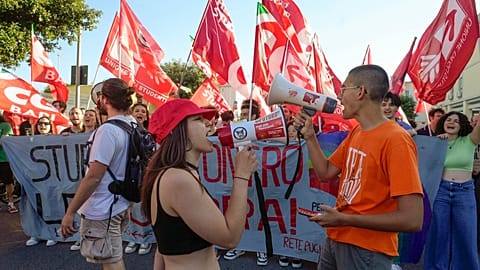 Demonstrators shout slogans during a protest against the G7 summit in Fasano, southern Italy, Friday, June 14, 2024. 
