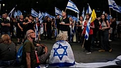 People take part in a protest against Israeli Prime Minister Benjamin Netanyahu's government, demanding new elections and the release of the hostages