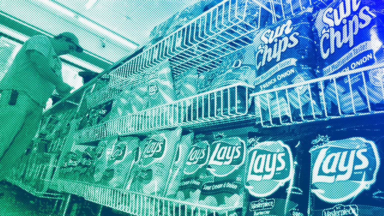 A convenience store customer make a purchase next to a shelf of snacks, in Boston, July 2005