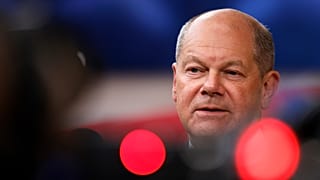 Germany's Chancellor Olaf Scholz speaks with the media as he arrives for an EU summit at the European Council building in Brussels, Monday, June 17, 2024.