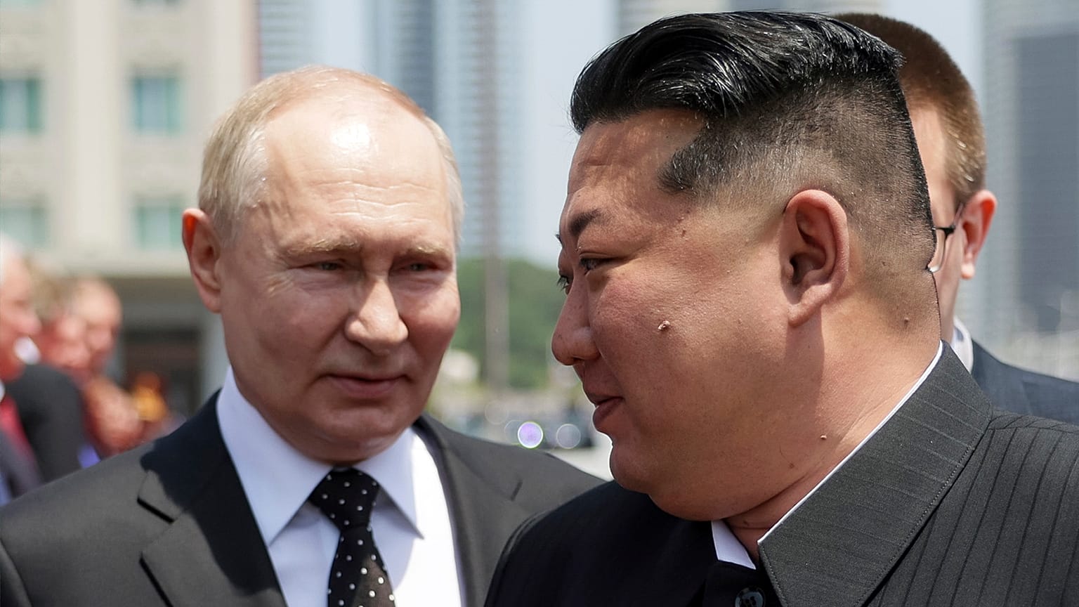 Russian President Vladimir Putin and North Korea's leader Kim Jong Un attend the official welcome ceremony in the Kim Il Sung Square in Pyongyang, 19 June 2024