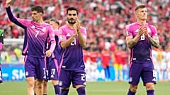 Germant celebrate qualifying for the round of 16 at the Euro 2024 football tournament in Stuttgart, Germany, Wednesday, June 19, 2024