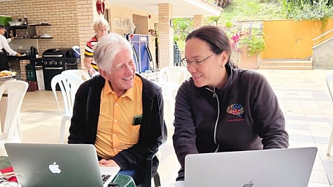  Dr Francisco Lopera, left, of the University of Antioquia, a neurologist, confers with fellow researcher Yakeel Quiroz of Massachusetts General Hospital. 