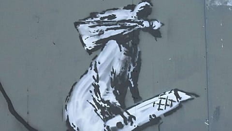 Banksy's rat with cutter behind the Centre Pompidou, Paris, 2019 