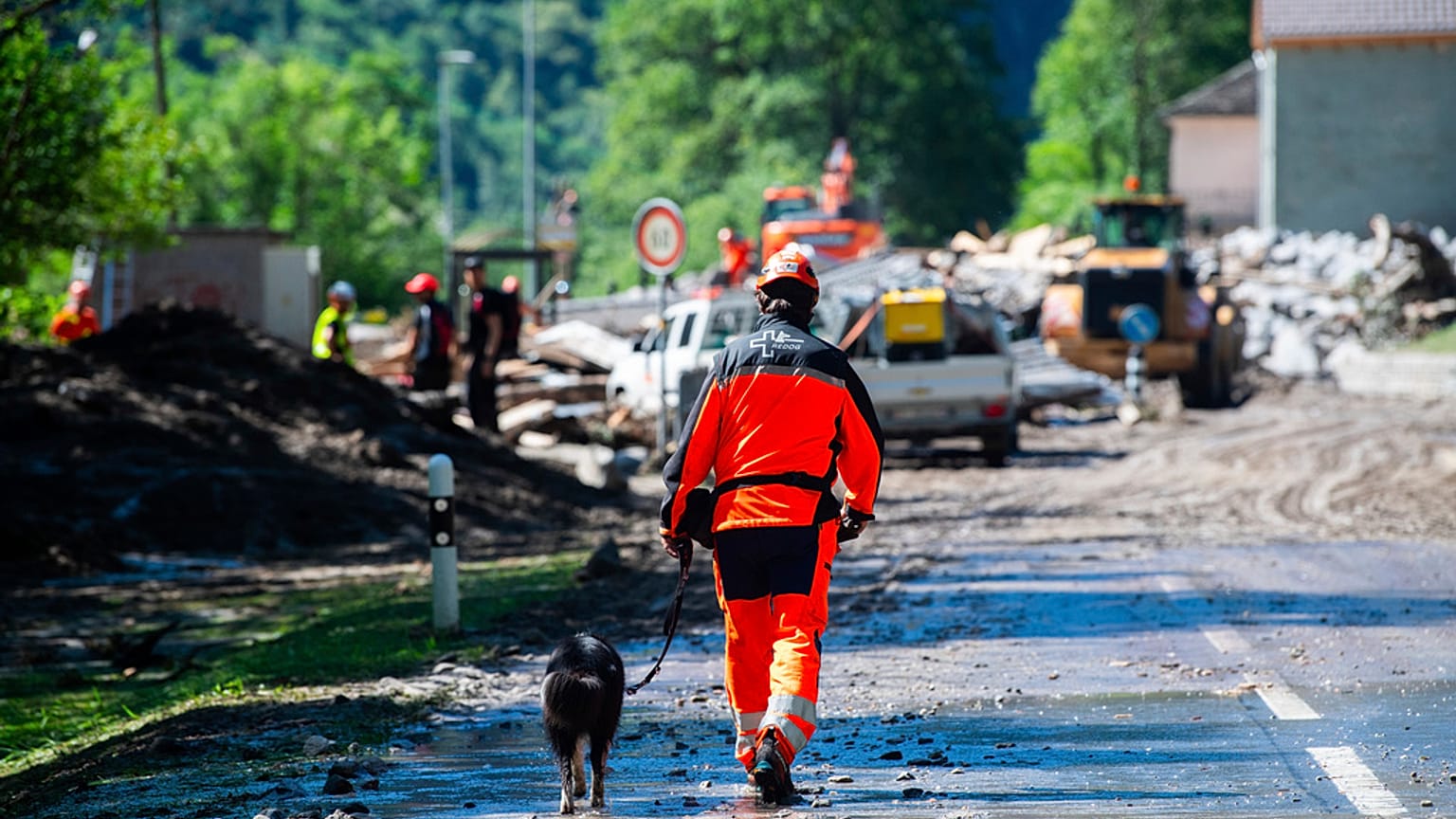 Cleanup work is underway at the Sorte village, community of Lostallo, Southern Switzerland, after a landslide, caused by the bad weather and heavy rain in the Misox valley.