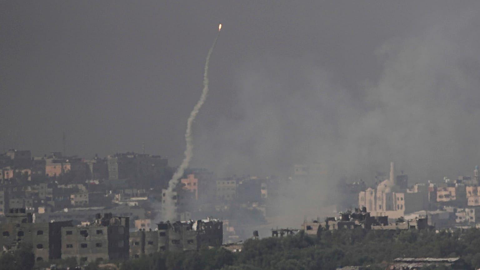 FILE - A rocket launched at Israel from the Gaza Strip is seen misfiring before landing inside Gaza, as seen from southern Israel, Oct. 23, 2023. 