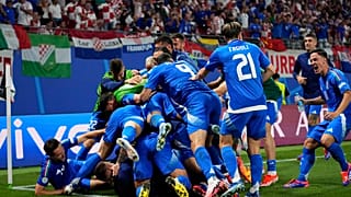 Italian players celebrate after teammate Mattia Zaccagni scored during a Group B match between Croatia and Italy at Euro 2024
