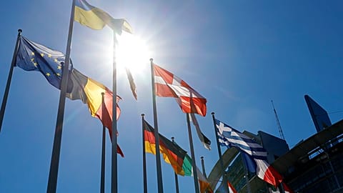 The Ukrainian flag, top, flies with others European flags outside the European Parliament ,in Strasbourg, France