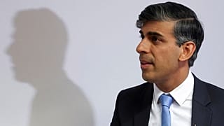 British Prime Minister Rishi Sunak's shadow is cast on a wall as he attends a Conservative general election campaign event, in Edinburgh, Scotland, Monday, June 24, 2024.