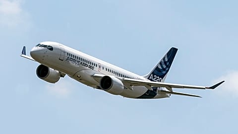 An Airbus A220 preparing to land at Toulouse-Blagnac airport in southwestern France