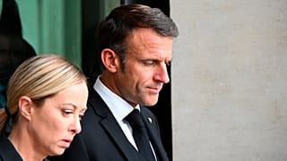 France's President Emmanuel Macron arrives with Italy's Prime Minister, Giorgia Meloni prior a meeting at the Palazzo Chigi in Rome, 26 September 2023
