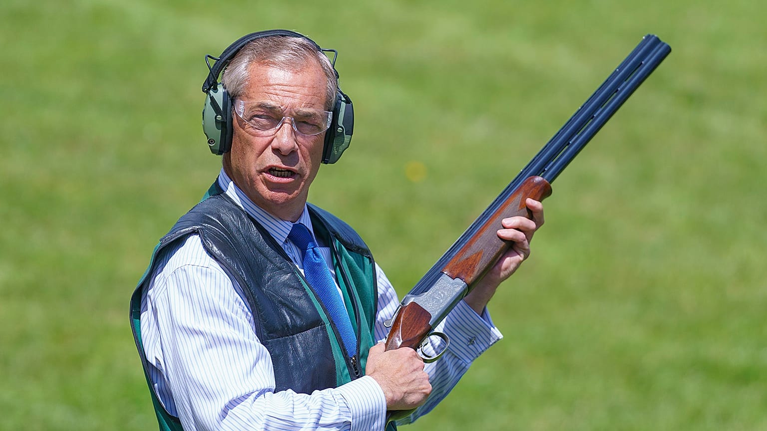 Reform UK leader Nigel Farage takes part in clay pigeon shooting during a visit to Catton Hall in Frodsham, Cheshire, while on the election campaign trail, 20 June 2024