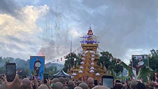 A crowd of Buddhist clergy and devotees attend the cremation of the late monk Bhaddanta Munindarbhivamsa in Bago, Myanmar