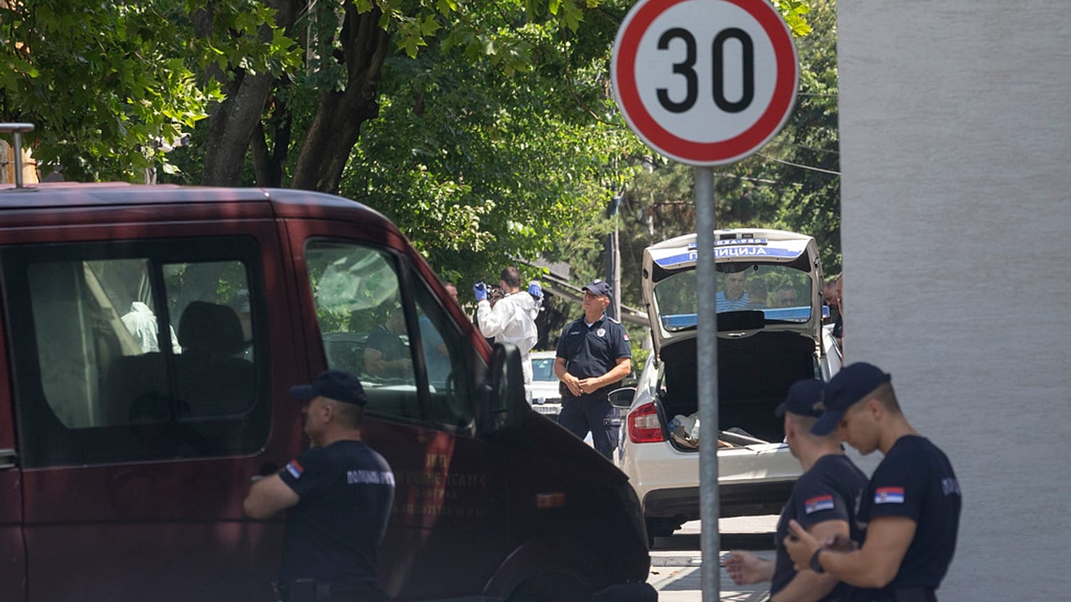 Police officers work at a crime scene close to the Israeli embassy in Belgrade, Serbia, Saturday, June 29, 2024.