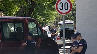 Police officers work at a crime scene close to the Israeli embassy in Belgrade, Serbia, Saturday, June 29, 2024.