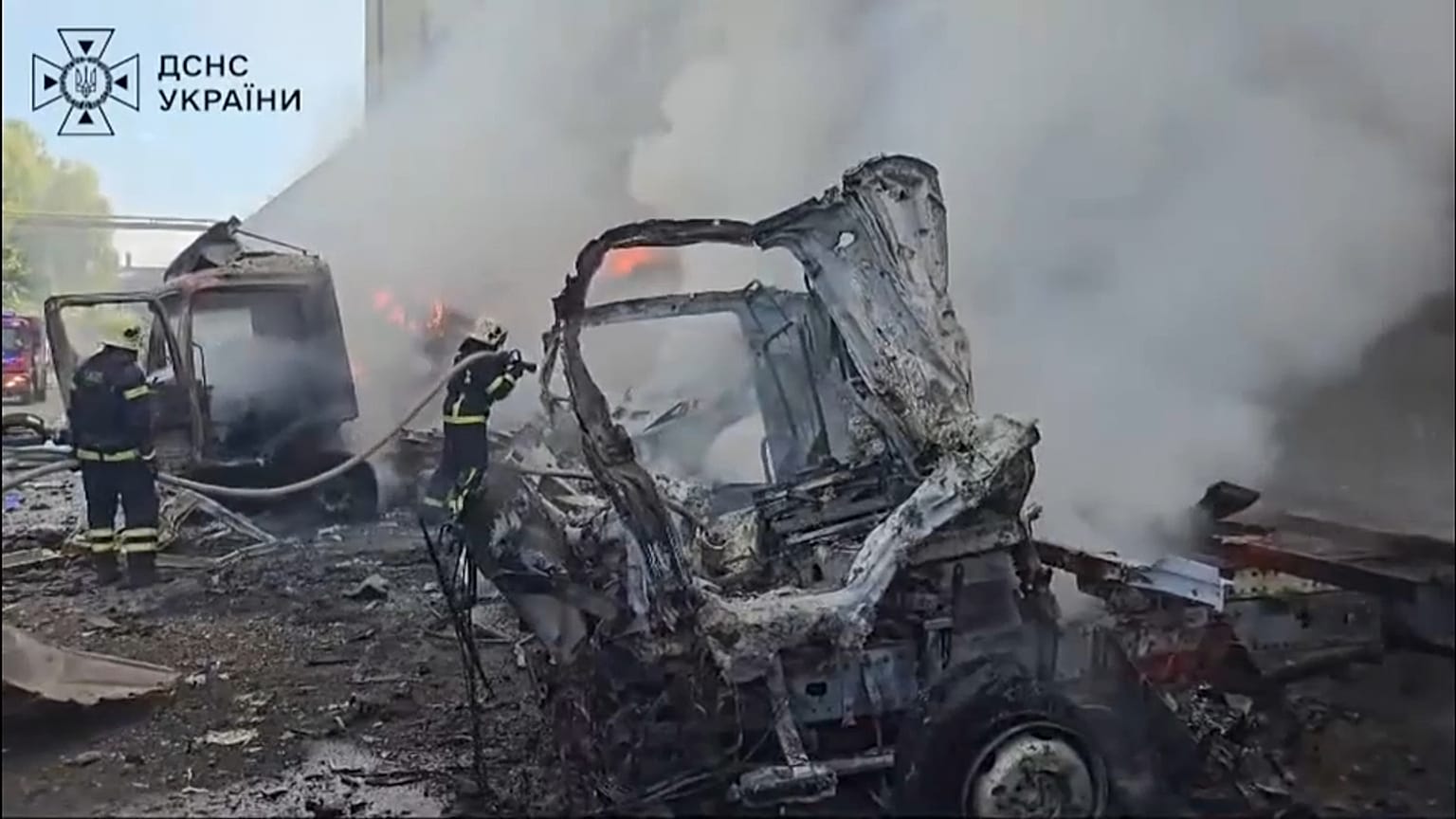 Firefighters put out a fire after an air attack from Russia.
