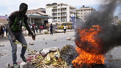 Anti-tax protesters in Nairobi clashed with riot police on Tuesday, blocking roads and burning tires after recent tax legislation caused deadly unrest.
