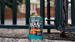 A can of baked beans is left at the gates at the Sydney Cricket Ground in Sydney, Saturday, March 5, 2022, as tribute to Shane Warne, who was renowned for eating the food whil