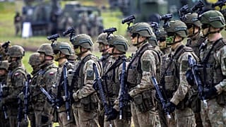 Lithuanian Army soldiers take part in a Lithuanian-Polish Brave Griffin 24/II military exercise near the Suwalki Gap near the Polish border, in Lithuania, 26 April 2024