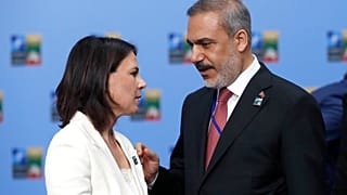Almanya Dışişleri Bakanı Annalena Baerbock (solda), Litvanya'daki NATO zirvesinde Türkiye Dışişleri Bakanı Hakan Fidan ile birlikte. 11 Temmuz 2023