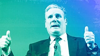 Keir Starmer, Leader of Britain's opposition Labour Party gestures during a question and answer session at a business conference in London, February 2024