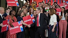 New PM Sir Keir Starmer and his wife Victoria greet supporters at the Tate Gallery