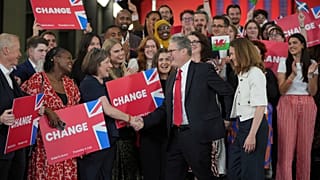 New PM Sir Keir Starmer and his wife Victoria greet supporters at the Tate Gallery