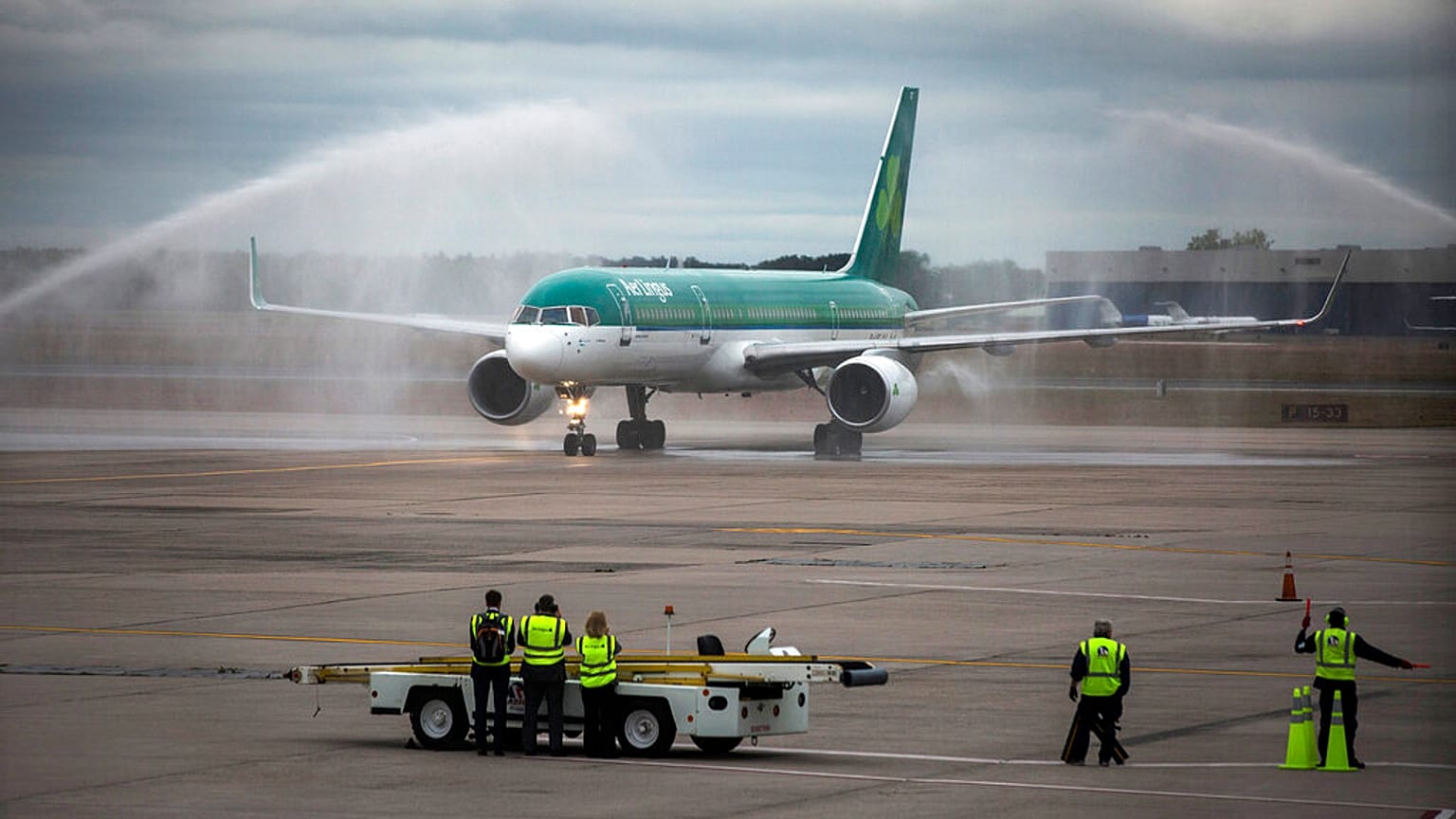 An air cannon salute greets an Aer Lingus flight arriving at Bradley International Airport in Windsor Locks, Conn., Wednesday, Sept. 28, 2016.