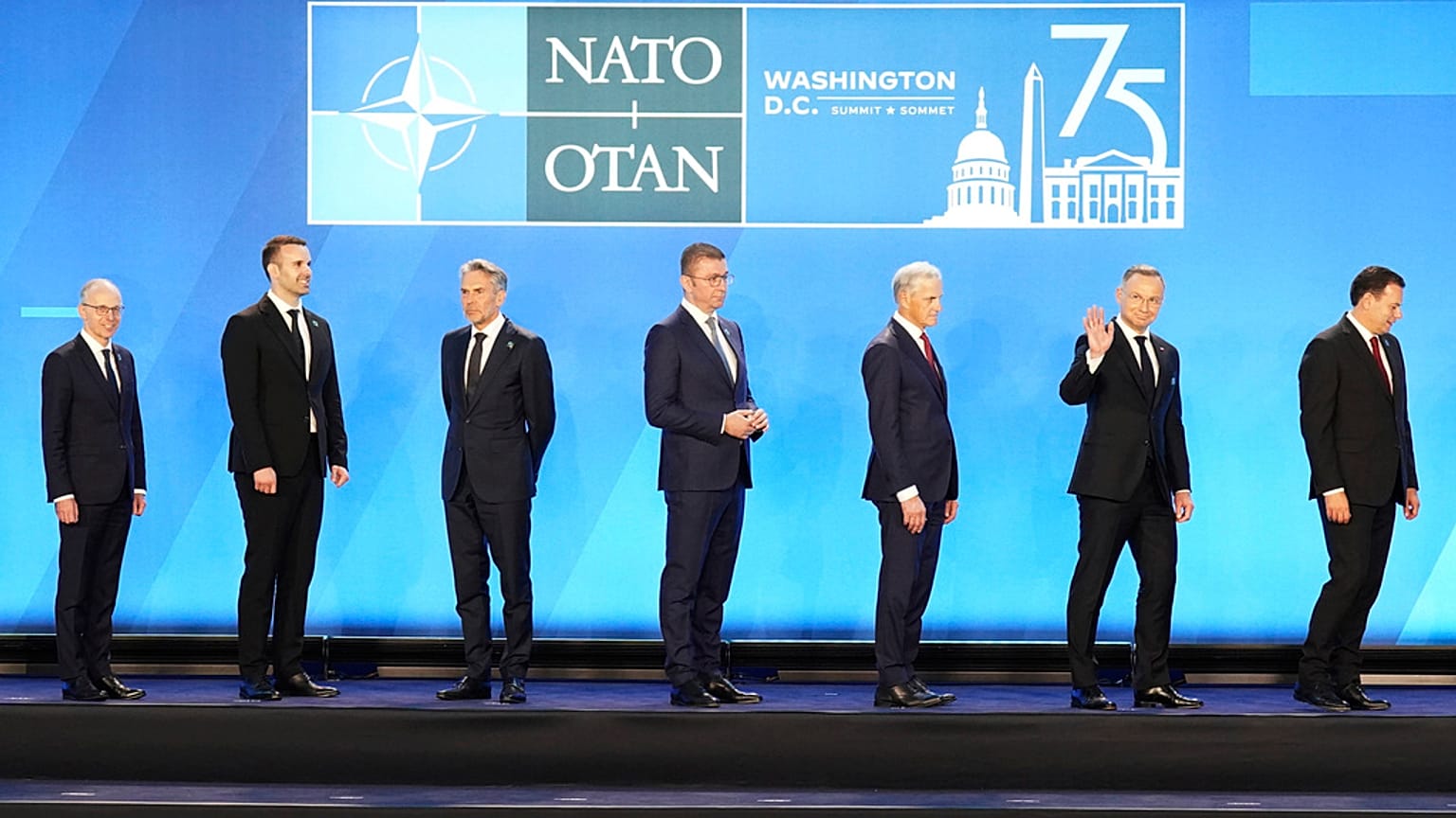 Nato leaders wait to leave the stage after the family photograph during the Nato 75th anniversary summit at the Walter E. Washington Convention Center, July 10th.