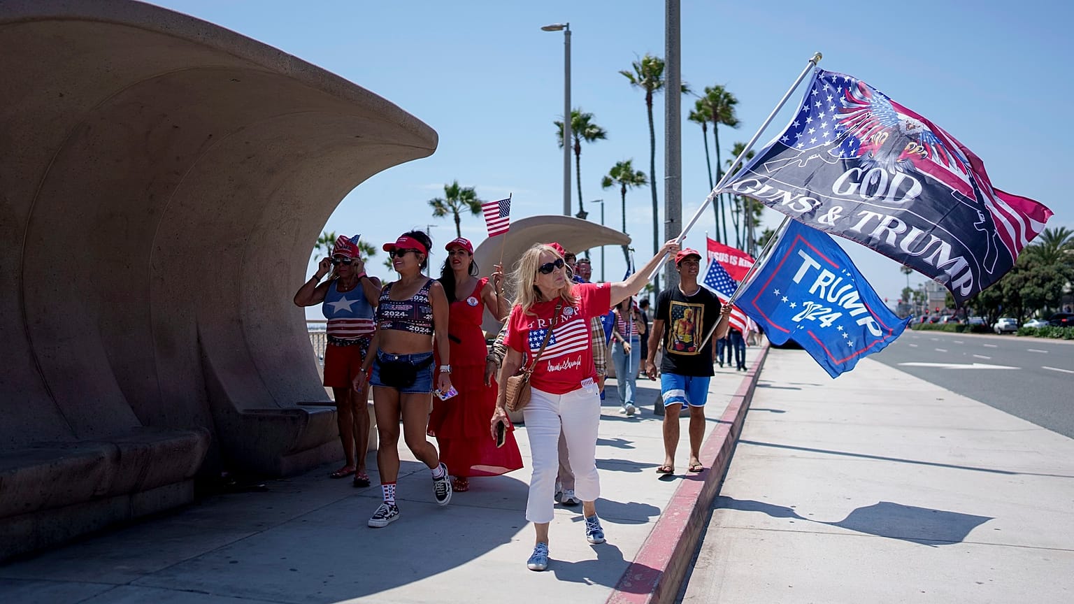 People rally in support of Republican presidential candidate former President Donald Trump in Huntington Beach,California on 15 July